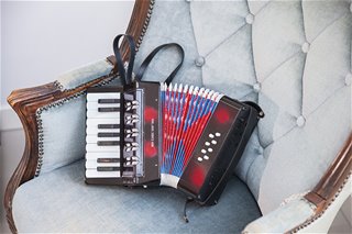 Accordion with music book - black